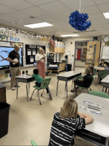 Student interns teaching in elementary classroom